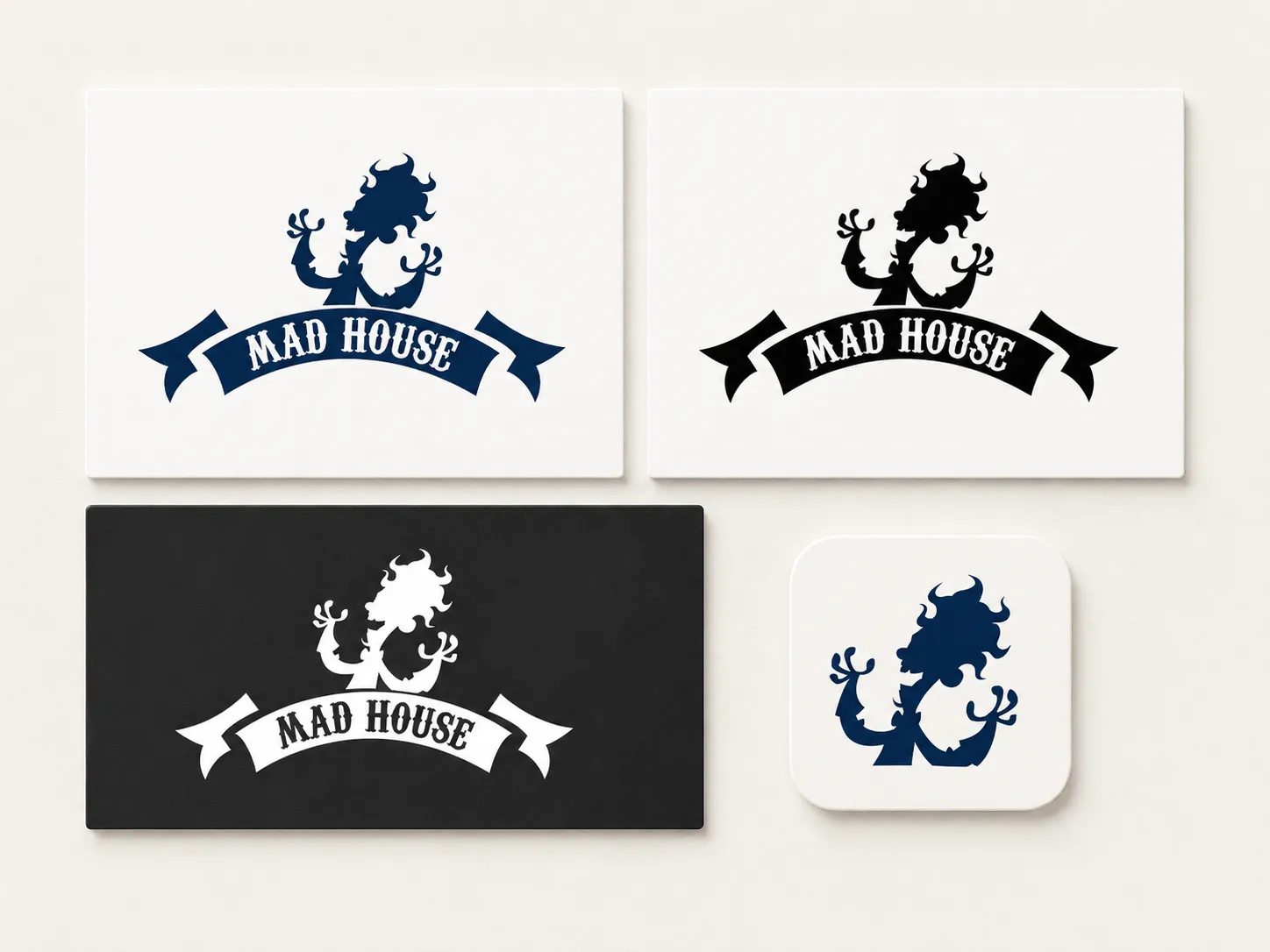 Four design variations of a stylized mad scientist logo reading Mad House on business cards and an icon.